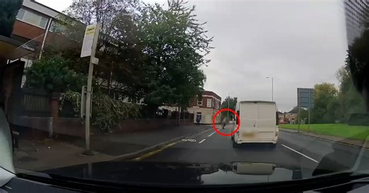 Woman rushed to hospital after police van crashes into her