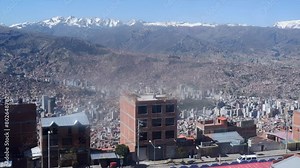 Dolly shot through window of Teleferico cable car over La Paz, Bolivia