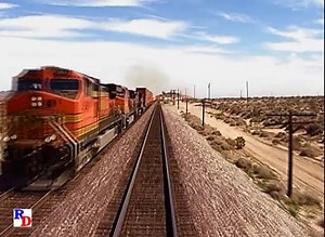 In the cab of a BNSF freight on the Cajon Subdivision, through the desert scenery and passing a westbound hotshot at the Indian Trail Road crossing. From the Pentrex show "At the Throttle, Vol 2 - The Cajon Subdivision" https://rfd.video/ATT2 | Railfan Depot