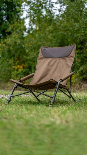Compac Low Chair & chill 🪑😎☕️ . Our Compac Low Chair features a lightweight frame and concertina design. These features not only make the chair extremely lightweight but also very compact, making it ideal for loading onto a barrow, packing away in your bivvy or for transportation. . As the name suggests, the Low Chair offers a low-profile viewpoint, making it ideal for watching the water under the front of your bivvy when weather conditions dictate shade or shelter. The arms and headrest are a