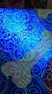 5.1K views · 148 reactions | You saw the same quilt last week.... but here is Brenda's "Feel It In Your Bones" under a blacklight! HOW FUN!! Maker: Brenda Quilt Pattern: Feel It In Your Bones by Rose City Originals Pantograph: 016 - Chrysanthemums by My Creative Stitches Thread Color: Glide 40wt Citron Quilted on my @TheGraceCompany 16x Elite with Quilters Creative Touch automation | Rose City Originals | Facebook