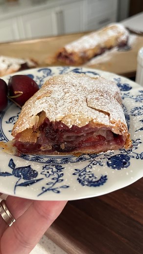 🍒 Learn How To Make Cherry Strudel From Scratch! There’s nothing like an authentic Slovenian strudel with a crispy crust and juicy cherry filling. P.S. You can use fresh or frozen cherries 🙌🍒 You will find the recipe on my YouTube channel and website. — Link in bio *** If you are seeing this post on Facebook, click this link to follow the Recipe 👉🏻 https://youtu.be/DYyWOe3-7Y8?si=ywMZCNb8rCn-Trhq . . . #cherryseason #cherrydessert #cherrystrudel #češnje #slovenska_kuhinja #sloveniankitchen