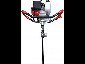Using a 52cc gas post hole auger to drive a 30" mobile home anchor into the ground.