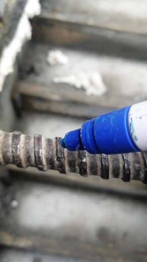 Color-Coding Metal Pipes with a Blue Marker