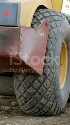 Road-roller working at construction site 