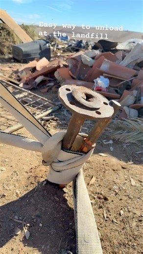 Easy way to unload a trailer at the landfill using towing straps #fyp #trendingshorts #construction