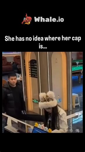 trend_tok_hub on Instagram: "The post features a 13-second prank video of a young woman in a billiards lounge frantically searching tables and chairs for her missing fluffy white hat, unaware her male companion had stealthily removed it from her head moments earlier. Posted by @AnayaSpirit on Christmas Day 2025, the clip has garnered 977k views and 8k likes, tapping into viral trends of cute, relatable confusion that amplify shares during holiday downtime. Viewer replies focus on her endearing b