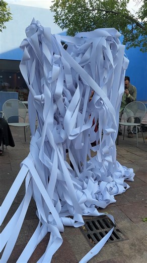 Denise Uyehara: Threads of Hope in the Courtyard In her radiant and deeply moving piece at SFAI, performance artist Denise Uyehara invites participants into a living installation—one that listens, gathers, and grows. Audience members are welcomed to share messages of hope and strength, written on spools and threads of paper. These offerings become part of a woven, tangled collective—a physical manifestation of resilience and connection that unfolds in the sunlit courtyard. It’s an artwork alive 