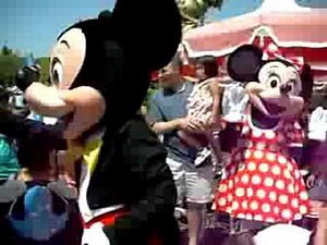 Mickey and Minnie "sing" Happy Birthday in Disneyland