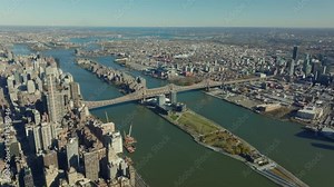 Panoramic view of Queensboro Bridge connecting city boroughs over East River. Manhattan, New York City, USA