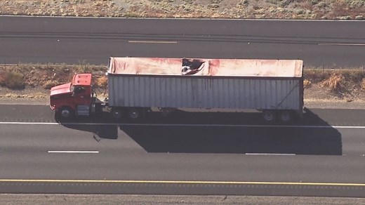 Woman dies in skydiving accident after crashing into semi-truck