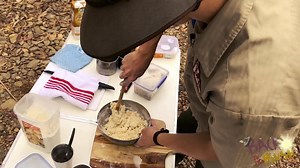In this video I demonstrate a technique of making damper. Damper is a traditional and iconic Australian bread baked in the coals of a campfire or in a in a camp oven. It was prepared by Aboriginals and remote travelers of the Australian bush and outback. The basic traditional ingredients of damper are flour, water, and salt. | Back to the Bush Indigenous Corporation