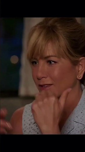 Mom teaches son how to kiss