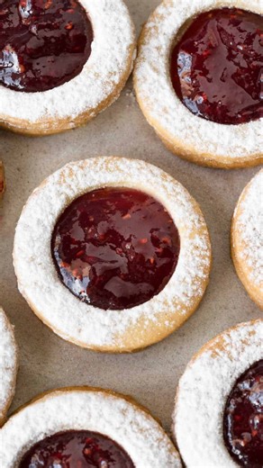 These Linzer Cookies are buttery almond shortbread rounds with a raspberry jam center! ❤️ They’re traditional for Christmas or just because you crave spice and sweetness 😉 They’re sweet, crunchy, and absolutely delicious 😋 Comment SEND or YES or RECIPE below 👇🏻 to get the recipe link with tips and printable recipe. https://vintagekitchennotes.com/linzer-cookies/ #bakingfromscratch #cookies #christmascookies #bakingrecipes #oldfashionedrecipes #linzercookies #holidaybaking #holidaycookies #ra