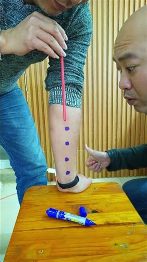 Replay it. The straw never actually disappears behind your arm.