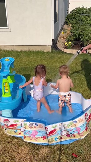 Running through the sprinklers with them is a new core memory🥹💙 #vlog #toddlermom #toddlers #fyp #momlife #toddlers #family | Michael Gordon
