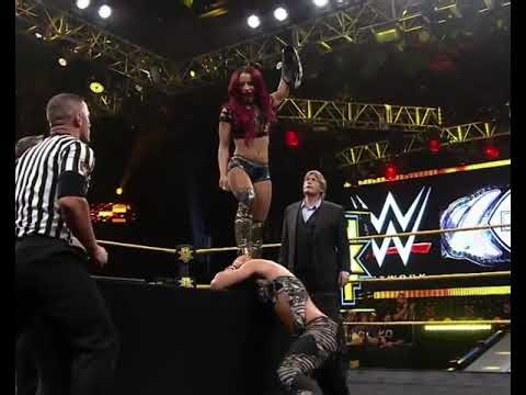 Sasha Banks victory pose on Becky Lynch