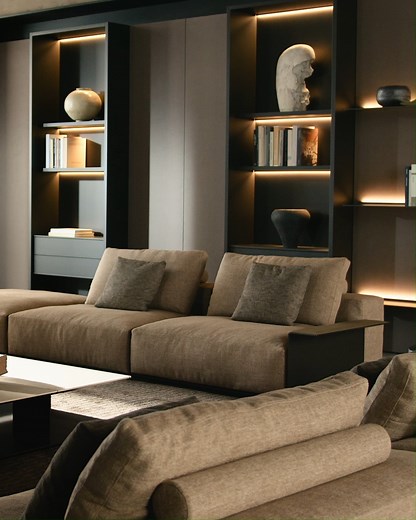Experience the beauty of a living space where every element comes together in perfect harmony. From the enveloping Sunday seating collection to the refined bookshelf and coffee table, this environment inspires moments of connection, relaxation, and timeless elegance. #poliform #poliformlifestyle | Poliform