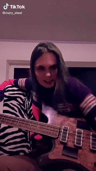 Rock and Roll Guitar Performance in Relaxed Setting