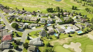The community of Rivershore along a golf course near Kamloops, British Columbia, Canada is seen from a aerial drone viewpoint
