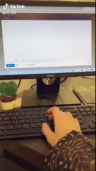 Close-Up of Typing on a Dell Keyboard