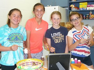 Redeemer youth help Salvation Army FAITH families prepare for fall