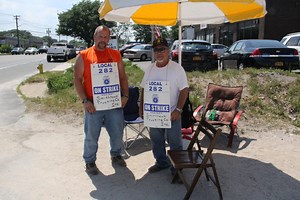 Union Workers Picket Outside Smithtown Concrete Over Labor Dispute