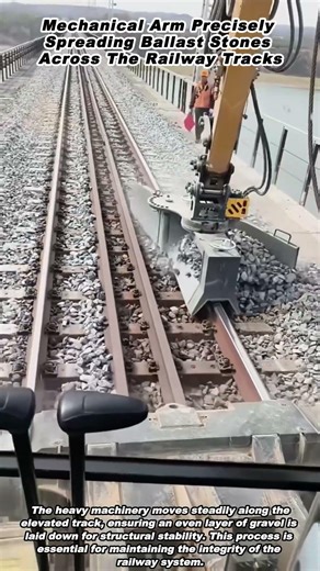 Mechanical Arm Precisely Spreading Ballast Stones Across The Railway Tracks