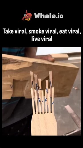 explainingproduction on Instagram: "This X post showcases a satisfying woodworking video where a craftsman chisels slots into wood to insert thin strips, forming the word "VIRAL" in a comb-like tool, cleverly tying into the caption's pun on viral trends: "Take viral, smoke viral, eat viral, live viral." Posted on December 14, 2025, by Indonesian creator @dian_arifiya , the video amassed 5.7 million views and 1,488 likes within hours, demonstrating the rapid spread of ASMR-style craft content on