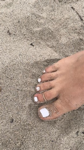 Add a touch of luxury with our 1mm 14K gold toe ring—subtle yet stunning. | ToeRings.com