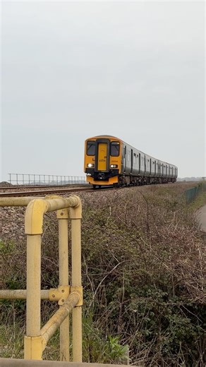 GWR class 150s speeds over the crossing at cockwood on the Exmouth service 150244-248 DMUS