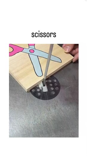 vyro.clip on Instagram: "The post showcases a 35-second video of a craftsman using a scroll saw to intricately cut a plywood board along a pre-drawn scissors outline, resulting in a dissectible triangular puzzle that reassembles into the tool's shape. Posted by Indonesian woodworker Yuda Hidayat (@YHidayat18088 ) with a minimalist "scissors" caption, it quickly amassed 121 likes and 108 replies, predominantly in Indonesian, lauding the precision and satisfying result as "rapih banget" (extremely