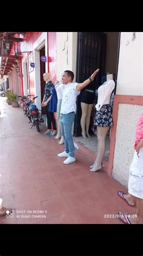 Street Fashion Showcase Next to Storefront