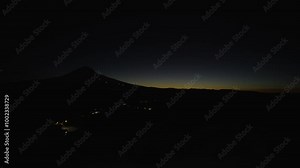 Time lapse of the sunrise behind Mt. Hood volcano Oregon USA