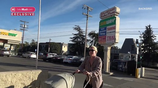 Dave Grohl baby mama Jennifer Young on a walk with their child