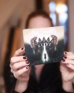 28K views · 2.3K reactions | 'Ωmega Alive' is out now and has been released in various formats. Simone Johanna Maria Simons Official gives you a preview of all the different formats. Unboxing Video: https://youtu.be/4HaPytCtZIk Order now: https://geni.us/Epicamerch | Epica | Facebook