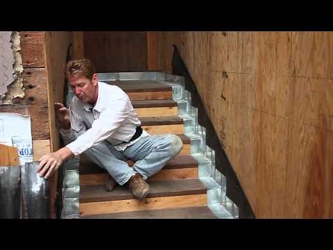 Install metal flashing on stairs before stucco