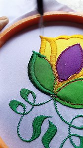 “Creating an inspiring embroidered flower with a beautiful blend of yellow and purple colors. The bright yellow brings warmth and joy, while the purple adds elegance and depth, coming together in a stunning design that sparks creativity and artistic inspiration. Every stitch tells a story of passion, patience, and love for embroidery art.” 🌼💜 #embroidery #art #sewing #diy #inspiration | Sewing Embroidery