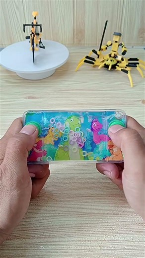 Playing water game T-rex#gaming #toys #fidgettoys #watergame