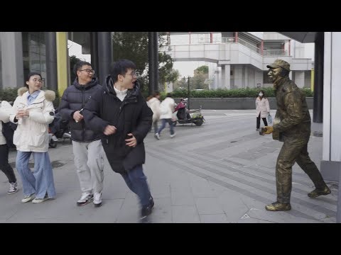 Funny Chinese Bronze Man Sculpture Prank.