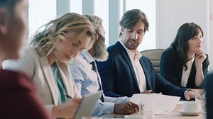 Corporate business people meeting in boardroom brainstorming colleagues discussing strategy sharing problem solving ideas working on deadline collaborating in busy office 4k | Premium Stock Video Footage