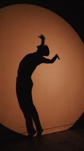 Silhouette of a dancer in expressive movement