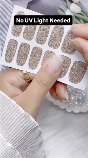 NO UV Lamp Needed, Secret Nails New Gel Nail Strips Love gel nails but hate UV lamps, damage, or long routines? Meet our new Gel Nail Strips just peel, stick, and go. No UV lamp. No drying time. Salon-perfect nails in minutes, right at home. You can get these No UV Gel Strips from our Secret Nails website, here’s our website address: www.secret-nails.com | Secret Nails