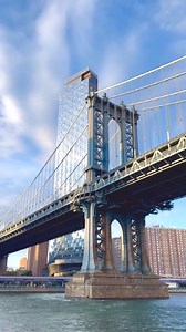 4.1K views · 191 reactions |  Manhattan Bridge, suspension bridge over the East River connecting southeastern Manhattan with western Brooklyn in New York City. The bridge first opened to traffic in 1909, eight years after construction started. ✨ @visit.newyork you can follow us on Youtube https://www.youtube.com/@TimesSquareNewYork | New York City Photographers | Facebook