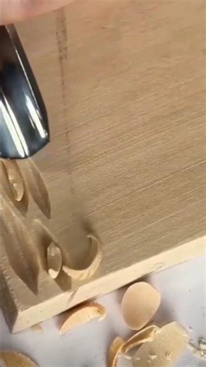 Carving Details onto Wood Surfaces Using an Electric Rotary Chisel