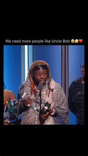 RapMusic | RIP Uncle Bob 🤧 Uncle Bob, whose real name was Robert Hoobler, was a New Orleans police officer who saved Lil Wayne’s life when he was 12... | Instagram