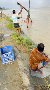 Fisherman catching silver hilsa fish from the river using a net #fblifestyletyle | Fishing Life With Rijvi
