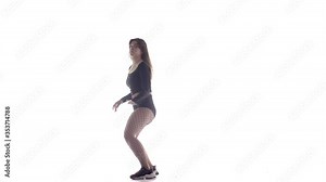 young sensual beautiful woman dancer with long hair in fishnet tights and shorts vigorously dancing dancehall twerk, street modern dance, long shot, isolated