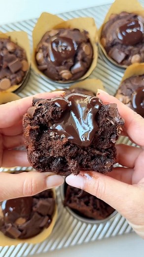 MARIAM | Cookin’ with Mima on Instagram: "Extra Rich Chocolate Muffins, the only decadent chocolate muffin recipe you’ll ever need. Stuffed with chocolate ganache. Everyone will be asking you to make this recipe over and over again. Ingredients 1 3/4 cup flour 3/4 sugar 1 egg 1/2 cup neutral oil 3/4 cup full fat yogurt 2 tsps vanilla extract 1 tbsp baking powder 1 cup Belgian milk chocolate (save 1/4 cup for topping) 1 cup semi-sweet or dark chocolate chunks (save 1/4 cup for topping) 1/2 cup bu