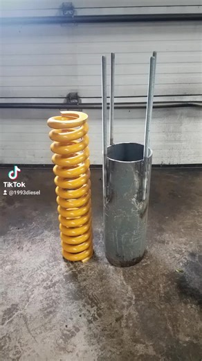 Installing Tension Spring for CAT 955L: A Unique Hack